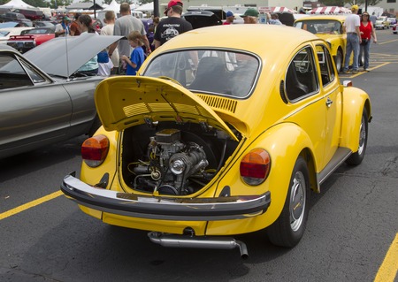 IOLA, WI - JULY 11:  Back of 1976 VW Yellow Bug / Beetle Car at Iola 43nd Annual Car Show July 11, 2015 in Iola, Wisconsin.のeditorial素材