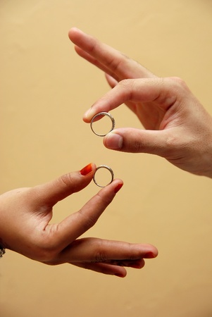 Couple hand holding a ring の写真素材