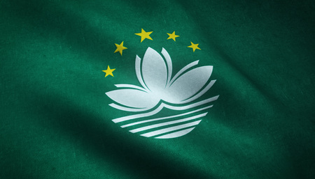 Realistic flag of Macau waving with highly detailed fabric texture.の写真素材