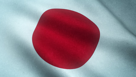 Realistic flag of Japan waving with highly detailed fabric texture.の写真素材