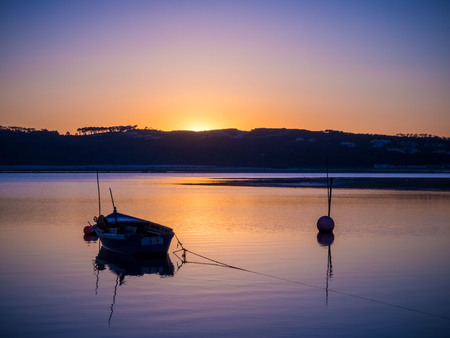 Fishing boat at the riverの写真素材