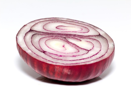 isolated half of red onion on white backgroundの写真素材