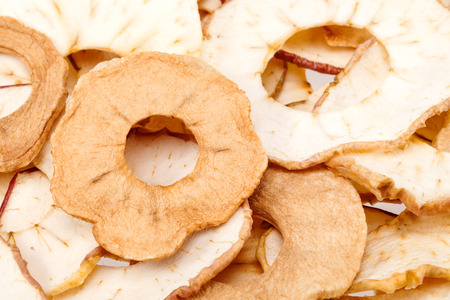 background of dried apple slices, close up.の写真素材