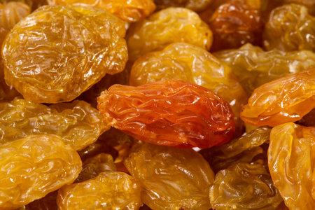 background of sultana raisins, close up.