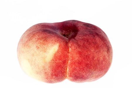 Fruit of Saturn Peach  ( Paraguayos )  isolated on white background .の写真素材
