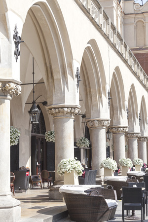Restaurant under the arches of Cloth Hall ( Sukiennice), Main Market Square, Krakow, Polandのeditorial素材