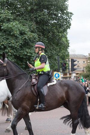 LONDON, UNITED KINGDOM - JUNE 25, 2017 : Riding police during ceremonial changing of the London...
