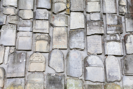 Jewish cemetery in Kazimierz Dolny, Czerniawy, Poland. Symbolic Wailing Wall built of tombstones destroyed by German Nazis during World War II.の写真素材
