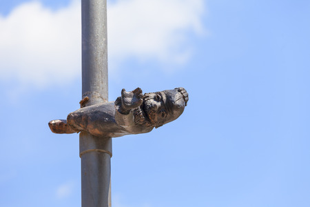 WROCLAW - POLAND, JUNE 12, 2017 : Wroclaw dwarf, small fairy-tale bronze figurine on the street lamp, Wroclaw, Poland. There are over 350 dwarfs spread all over the city, they are a big tourist attractionのeditorial素材