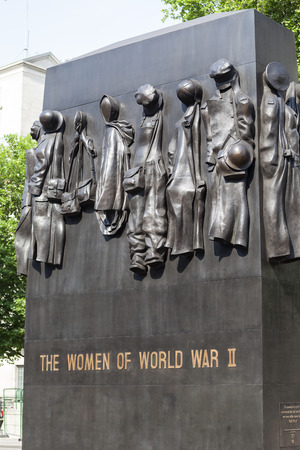 LONDON, UNITED KINGDOM - JUNE 21, 2017: Monument to the Women of World War II, British national war memorial. It was sculpted by John W. Millsのeditorial素材