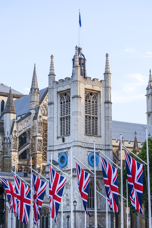LONDON, UNITED KINGDOM - JUNE 21, 2017: Westminster Abbey, one of the most important Anglican temple. Flags of the United Kingdomのeditorial素材