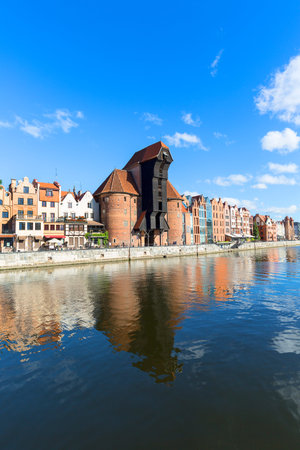 GDANSK, POLAND - JUNE 05, 2018 : The medieval port Crane of Gdansk, Long Embankment street,...