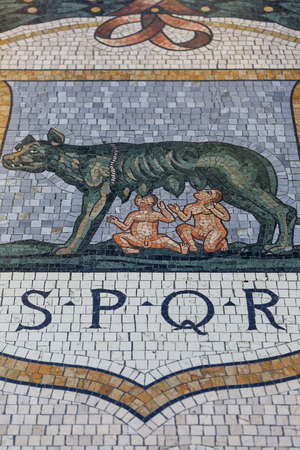 MILAN, ITALY - SEPTEMBER 28, 2018: Gallery Vittorio Emanuele II, luxury shopping mall. Decorative floor, mosaic with a she-wolf. Gallery was designed and built by architect Giuseppe Mengoni between 1865 and 1867のeditorial素材