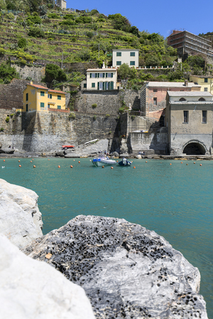 VERNAZZA, CINQUE TERRE - ITALY, MAY 12, 2019: View on seaside and typical colorful houses in small village, Riviera di Levanteのeditorial素材