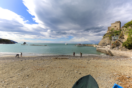 MONTEROSSO, CINQUE TERRE - ITALY, MAY 12, 2019: View on beach and sea, clouds in the skyのeditorial素材