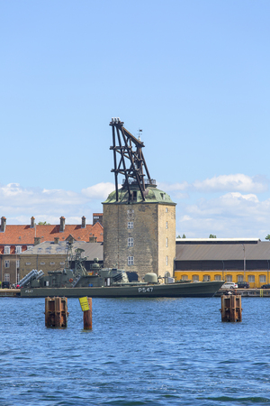 COPENHAGEN, DENMARK - JUNE 22, 2019: Holmen naval base in Copenhagen, Frigate of Royal Danish Navy moored in the portのeditorial素材