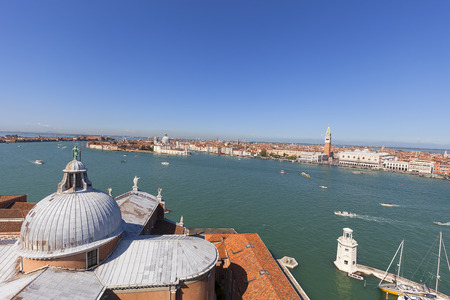 VENICE, ITALY - SEPTEMBER 21, 2017: Aerial view from the tower of the 16th-century Benedictine San Giorgio Maggiore church on St. Mark's Basin, city panoramaのeditorial素材