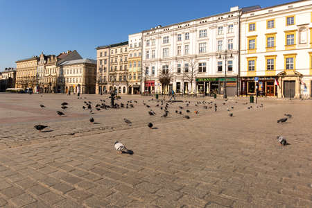 Krakow; Poland - March 24; 2020: Main Market Square, a deserted city due to the coronavirus epidemic, no tourists, closed restaurants and shops. Closed state bordersのeditorial素材