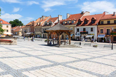 Sandomierz, Poland - July 10, 2020. View on market of 13th century city with colorful houses and old wooden well. Sandomierz is known for its Old Town, which is a major tourist attraction.のeditorial素材