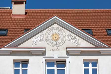Rzeszow, Poland - August 2020: Sundial on the facade of a tenement house in the market square
