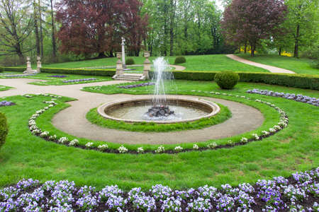 Lancut, Poland -May 5, 2013: Italian Garden in front of 16th century baroque Lancut Castle, former...