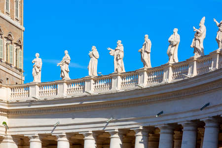 Vatican, Rome, Italy - October 9, 2020: Colonnade on St. Peter's Square in front of Saint Peter's Basilica. Statues of saints on the top.のeditorial素材