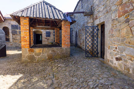 Dobczyce, Poland - June 4, 2021: 14th century Dobczyce Castle on Lake Dobczyce near Krakow, courtyard with wellのeditorial素材