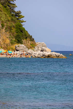 Capri Island, Italy - June 28, 2021: Beach on the Tyrrhenian Sea in the Gulf of Naples off the coast of the island of Capri next to the port Marina Grandeのeditorial素材