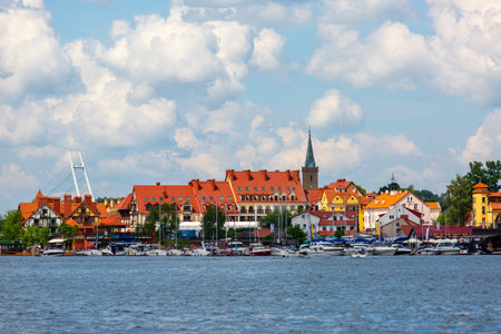 Mikolajki, Masuria, Poland - June 24, 2020: View from MikoÅ‚ajskie Lake of town, marina for...