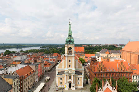 Torun, Poland - June 27, 2020: Aerial view of city from the top of Town Hall tower. 18th century Church of the Holy Spiritのeditorial素材