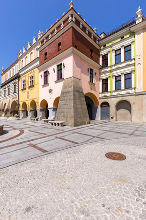 Tarnow, Poland - July 24, 2021: Town square with renaissance, colorful tenement houses. The market...