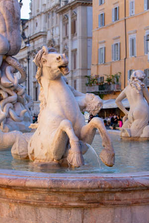 Rome, Italy - October 9, 2020: 16th century Fountain of Neptune (Fontana del Nettuno) located in Piazza Navona. Sculpture of Neptune fighting with an octopus, horse statue at the baseのeditorial素材