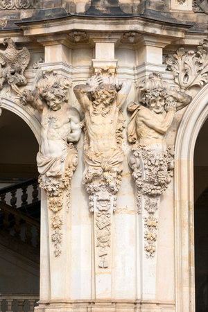 Dresden, Germany - September 23, 2020: 18th century baroque Zwinger Palace, sculpture at the entrance to Wallpavillonのeditorial素材