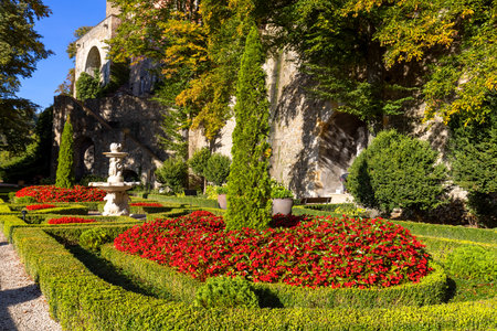 Walbrzych, Poland - October 1, 2021: Ksiaz Castle, medieval mysterious 13th century fortress, garden with beautiful plants and flowers. It is the third largest castle in Polandのeditorial素材
