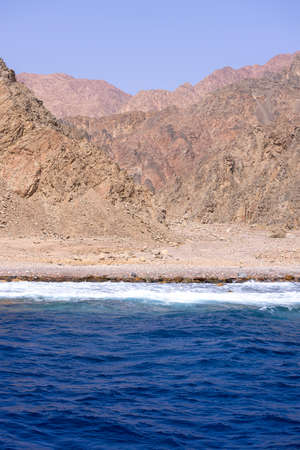 The Red Sea on the Gulf of Aqaba, surrounded by the mountains of the Sinai Peninsula, Dahab, Egyptの写真素材