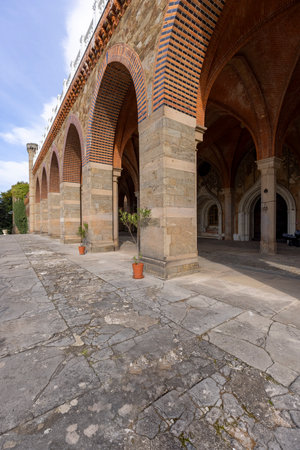 Kamieniec Zabkowicki, Poland - October 2, 2021: Kamieniec Zabkowicki Palace, 19th-century monumental palace located in a village in the Lower Silesian Voivodeship. A fragment of the wall surrounding the buildingのeditorial素材