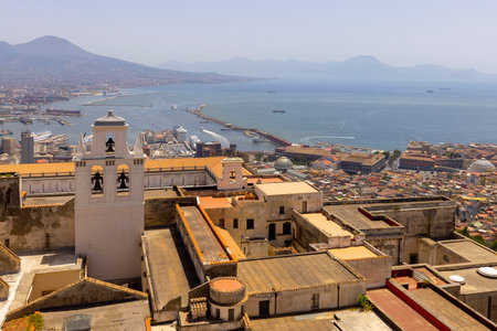 Naples; Italy - June 27; 2021: View of the city and Certosa di San Martino from Castel Sant'Elmo. Volcano Mount Vesuvius in a backgroundのeditorial素材