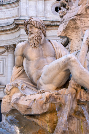 Rome, Italy - October 9, 2020: Sculpture personifying the River Ganges at 17th century Fountain of the Four Rivers (Nile, Danube, Ganges, Rio de la Plata) located in Piazza Navona.のeditorial素材
