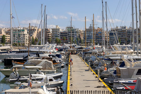 Athens, Piraeus, Greece - October 18, 2022: View of the port in the Bay of Zea (Pasalimani) with moored yachts on a beautiful sunny dayのeditorial素材