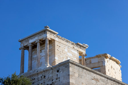 Athens, Greece - October 17, 2022: Temple of Athena Nike at Propylaia, monumental ceremonial gateway to the Acropolis of Athens. It is an ancient citadel located on a rocky slope above the cityのeditorial素材