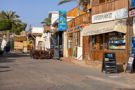 Dahab, Egypt - September 10, 2021: Main promenade with shops and restaurants, everyday life of an exotic small town on the Red Sea on the Sinai Peninsulaのeditorial素材