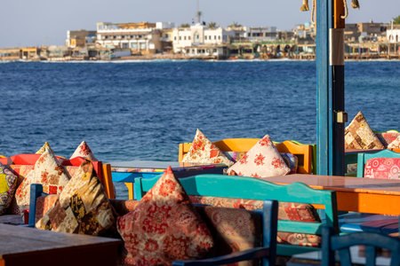 Dahab, Egypt - September 10, 2021: Restaurant on the shores of the Red Sea, on the main promenade in...