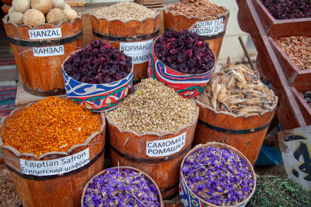 Dahab, Egypt, Red Sea - April 15, 2015: Street bazaar on an Egyptian street with dried flowers and leaves of various kinds of tea, chamomile, saffronのeditorial素材