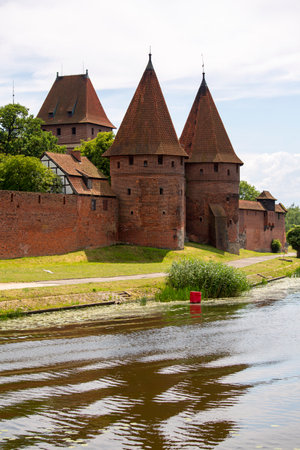 Malbork, Poland - June 25, 2020: 13th century Malbork Castle, medieval Teutonic fortress on the River Nogat. It is the largest castle in the world, UNESCO World Heritage Siteのeditorial素材