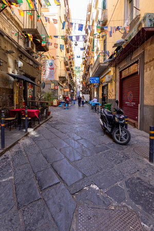 Naples, Italy - June 27, 2021: A typical Italian cityscape, colorful buildings, narrow streetのeditorial素材