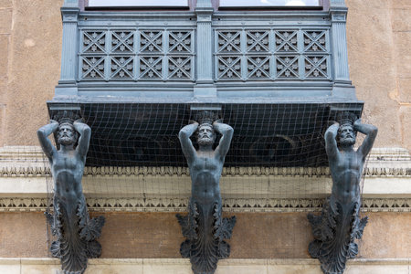 Brno, Czech Republic - March 5, 2023: Klein Palace, a Neo Renaissance tenement house, cast iron bay window supported by three male iron figures situated on Freedom Squareのeditorial素材