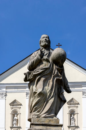 Kalwaria Zebrzydowska, Poland - August 18, 2022: Sculpture of saint on Paradise Square in front of 17th century Passion and Marian sanctuary of Bernardine Fathersのeditorial素材