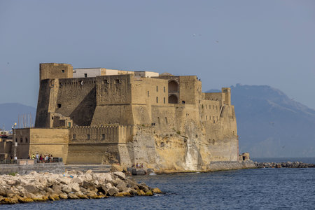 Naples, Italy - June 27, 2021: Castel dell'Ovo, medieval castle located on a tiny island off the coast of Naples near the Santa Lucia districtのeditorial素材