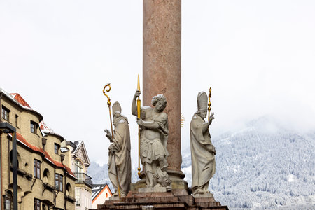 Innsbruck, Austria - February 26, 2023: Column of St. Anna on Maria Teresa Street. At the top of the column is a statue of Mary.のeditorial素材