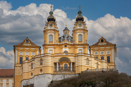 Melk, Austria - February 24, 2023: View of Melk Abbey with Collegiate Church towers on background of blue sky. It was founded in 11th century, today's baroque abbey was built in 18th centuryのeditorial素材
